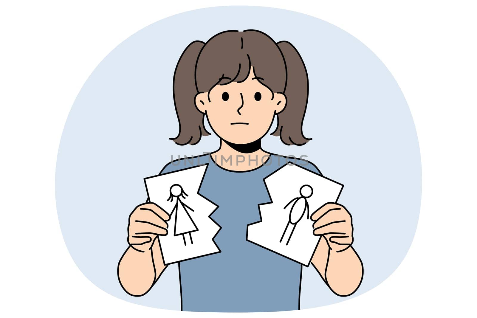Sad little girl is nervous about parents divorce and is holding torn drawing of mom and dad. Sad child suffers after learning about dissolution of marriage between mother and father