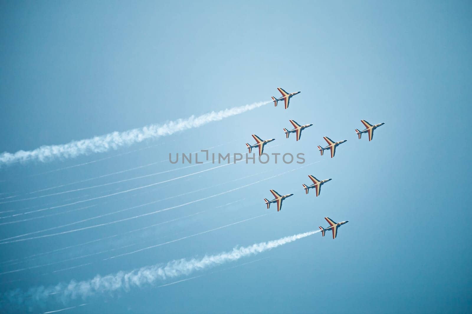 Dinard, France - August 24, 2008: French Air force, formation flying with 8 Alpha Jets of the Patrouille de France at airshow