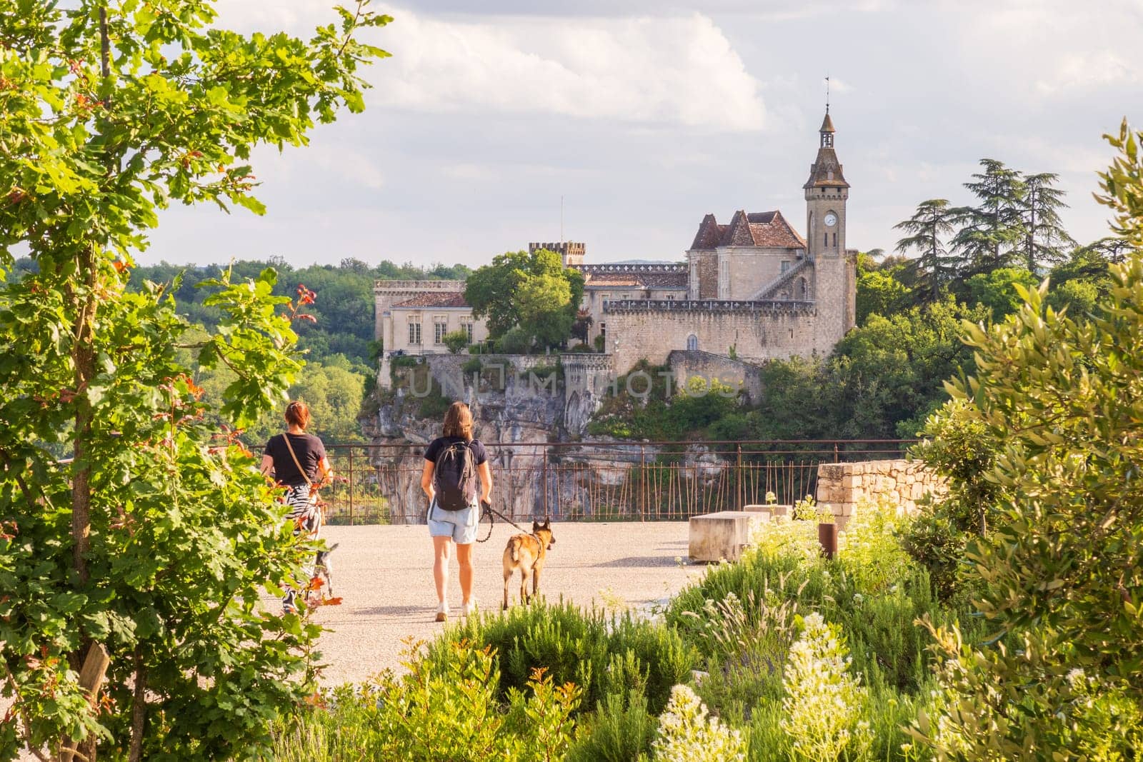 Rocamadour, France - June 17 2024: Girls walking to Citadel of Rocamadour city, famous travel destination in France