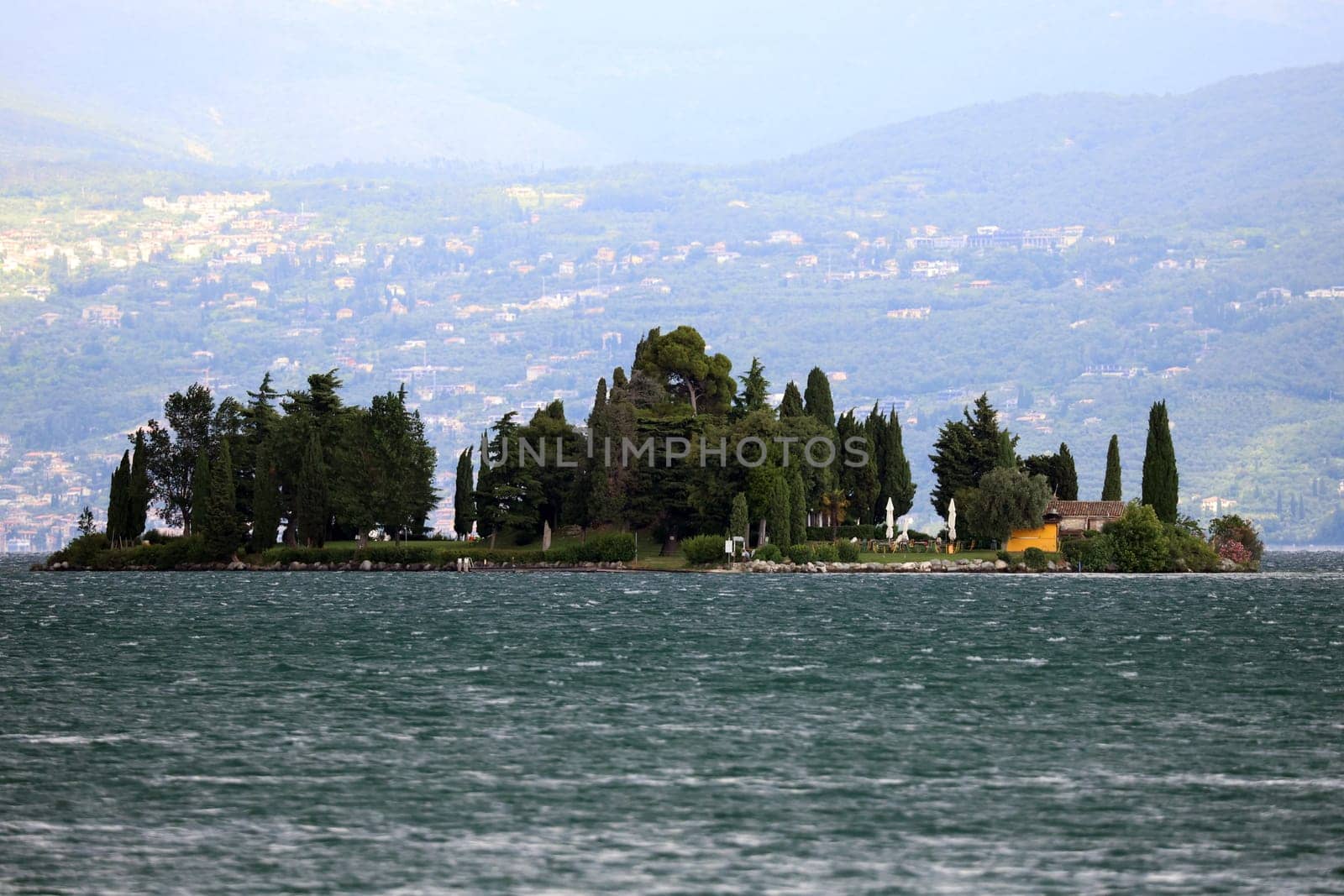 Small island in front of the bay of Manerba del Garada on Lake Garda  Travel Photography - Lake Garda / Lago di Garda / Italy /Italy / Italia