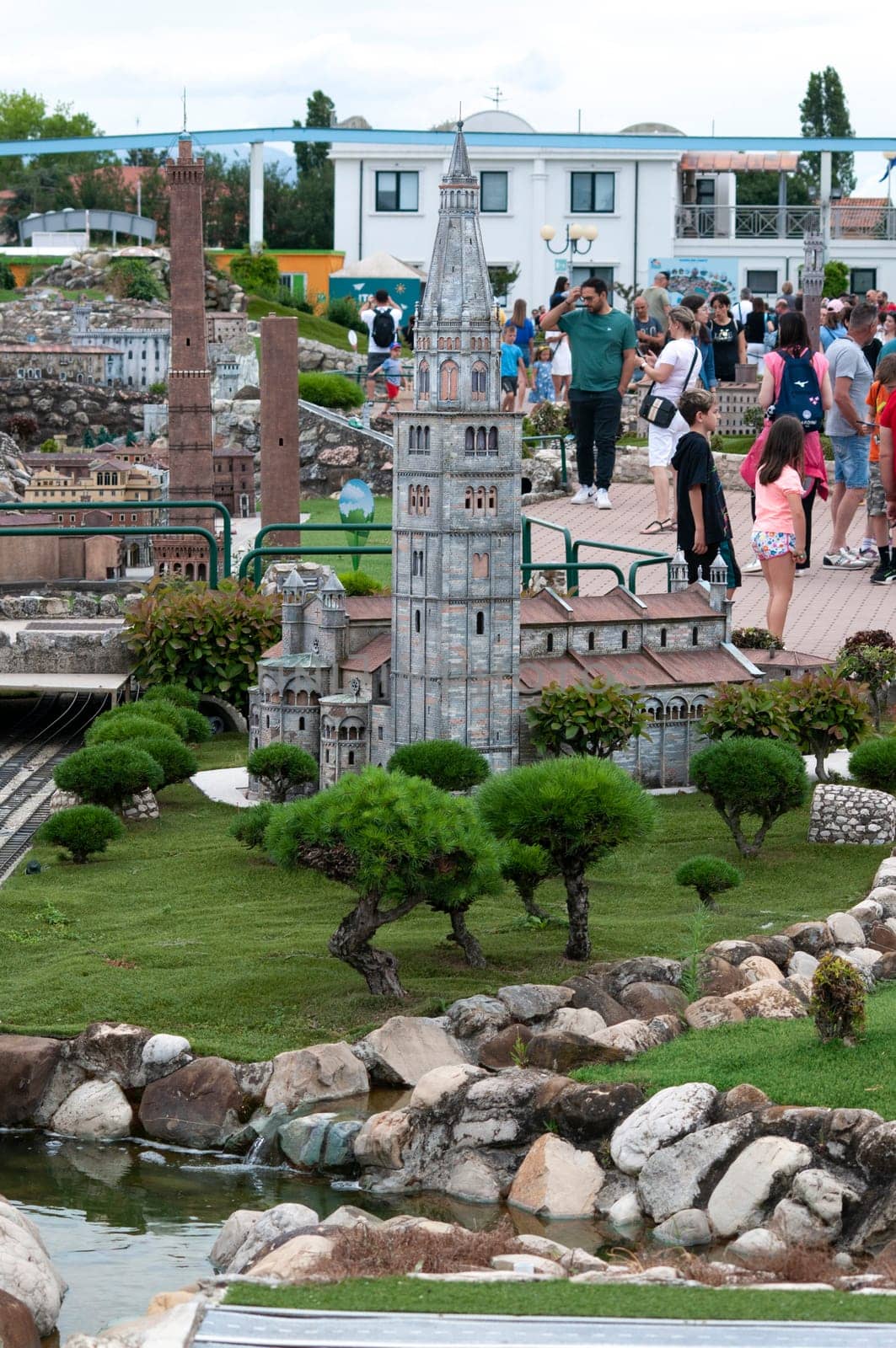 Viserba, Italy - June 25, 2024: People going at Theme park Italy in Miniature or Italia in Miniatura in Rimini, Italy - Reproduction of famous attractions in a small scale