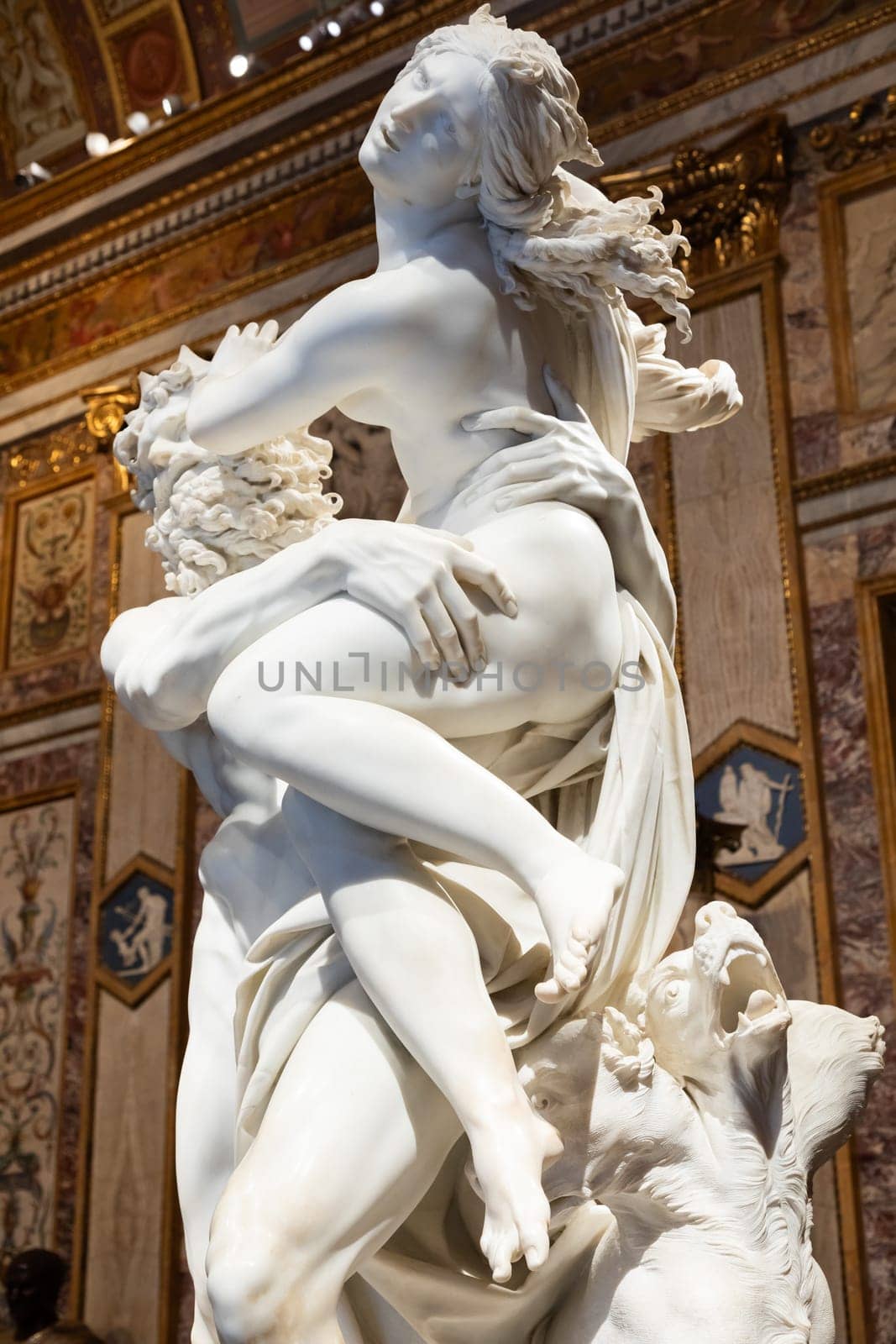 Rome, Italy - 28 December 2023: Galleria Borghese - Borghese Gallery - The rape of Proserpina, by Gian Lorenzo Bernini, 1622 - white Carrara marble statue