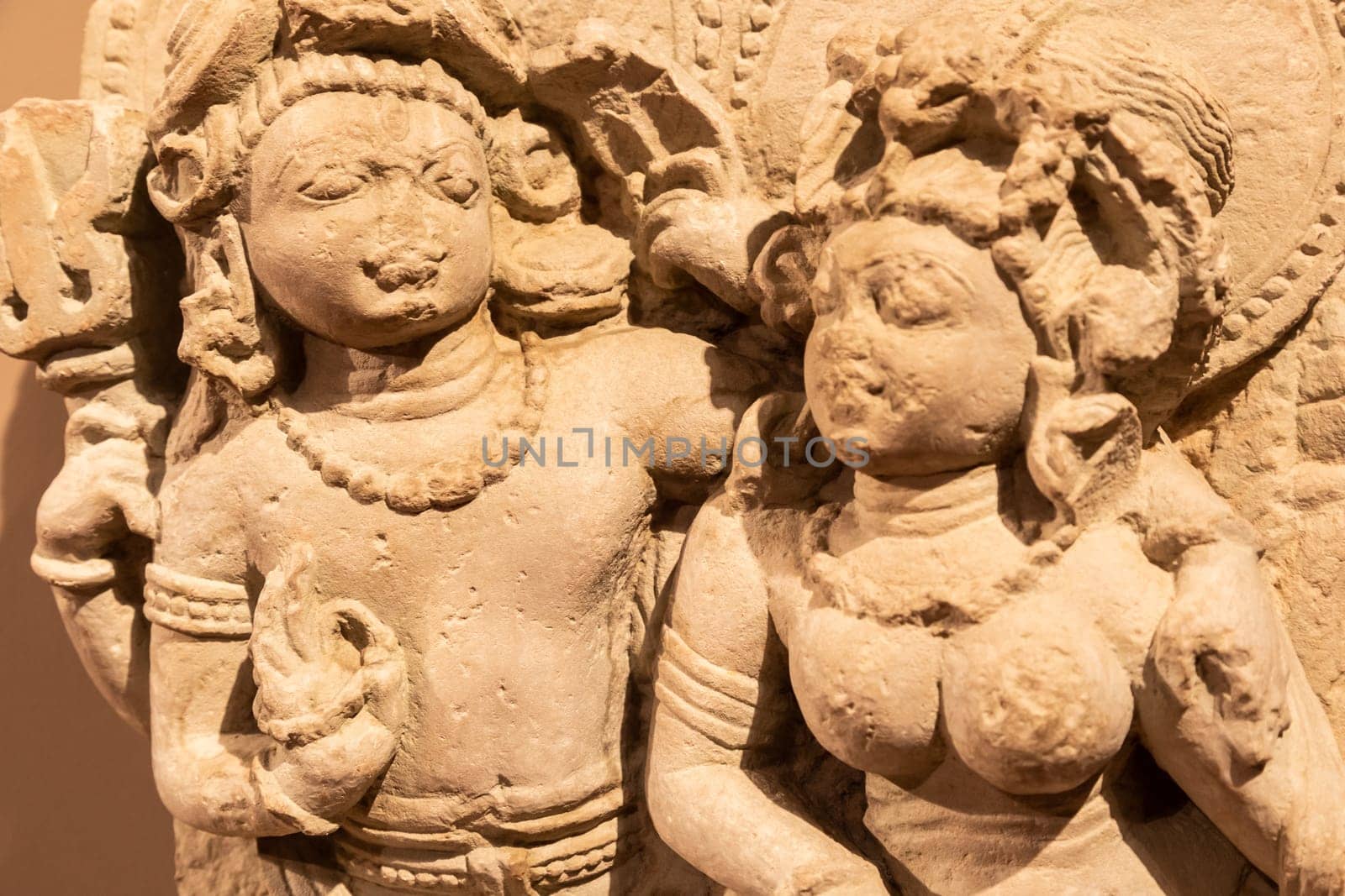 Turin, Italy - May 2023: Oriental Art Museum - Shiva, the Hindu god, with his wife Parvati. Concept for tantra, Kamasutra, tantric sex