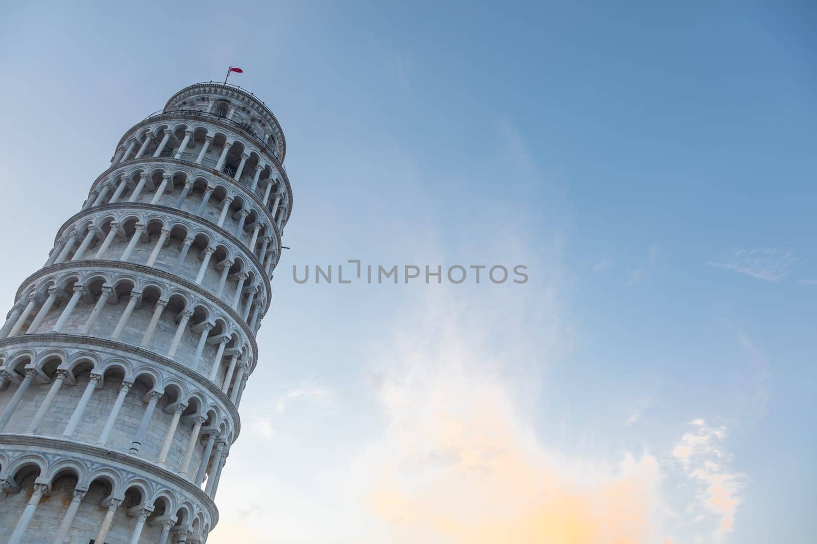 Pisa, Italy. Leaning tower sightseeing with blue sky background. Italian travel destination