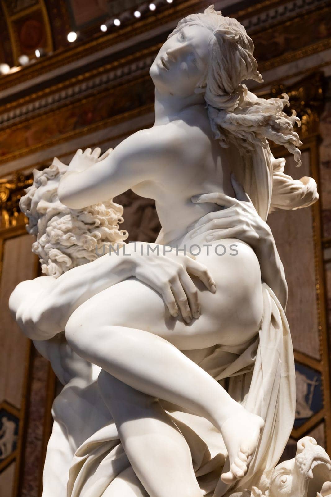 Rome, Italy - 28 December 2023: Galleria Borghese - Borghese Gallery - The rape of Proserpina, by Gian Lorenzo Bernini, 1622 - white Carrara marble statue