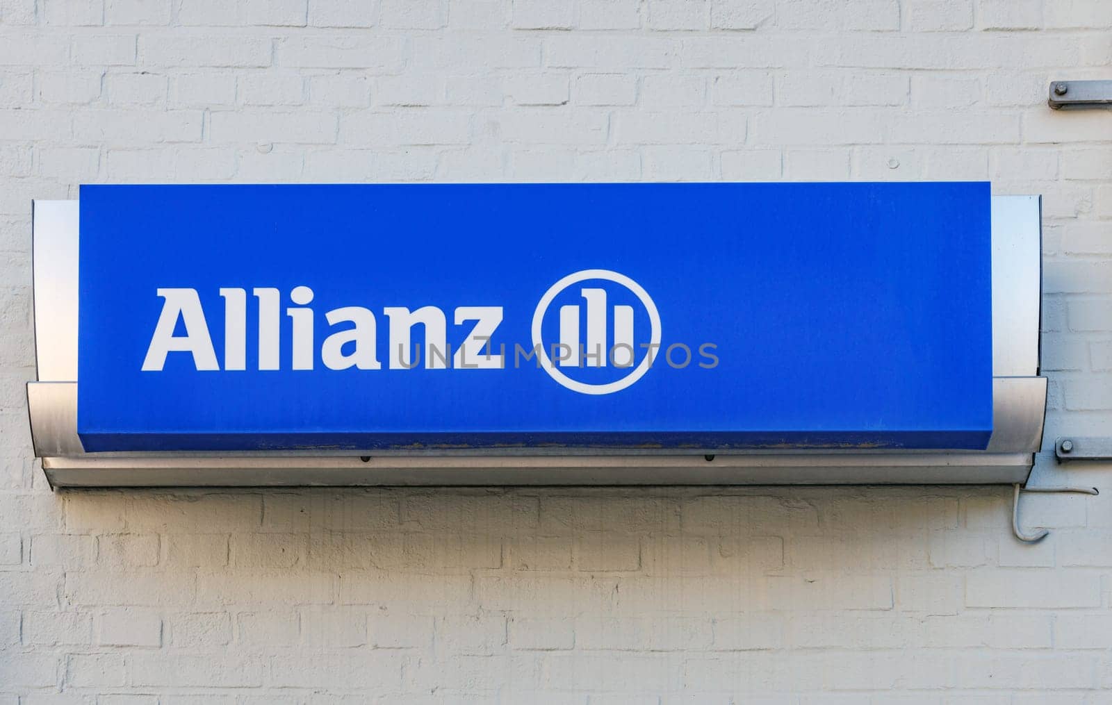 BLANKENBURG, SAXONY-ANHALT, GERMANY- 09-04-2023: ALLIANZ SIGN on a House Facade. Allianz is a European financial services company headquartered in Munich, Germany.