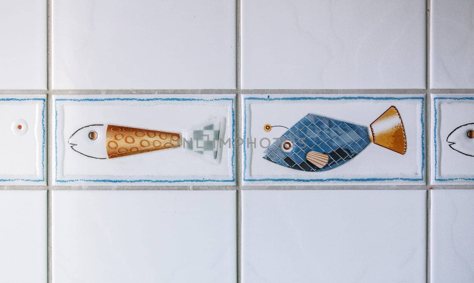 GERMANY, QUEDLINGBURG - September 06 -2023: Tiles with beautiful fish motifs on the wall