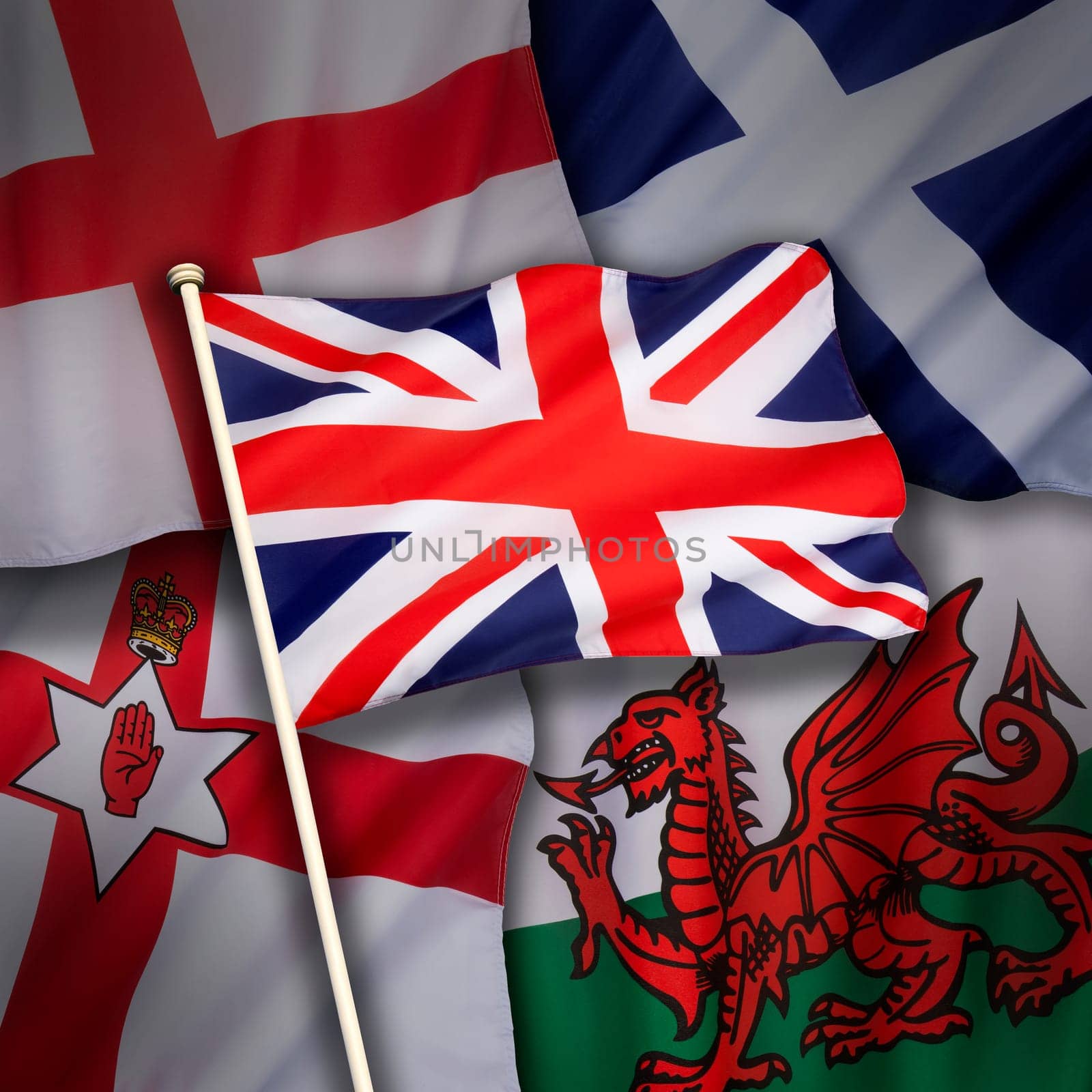 The flags of the United Kingdom of Great Britain - England, Scotland, Wales and Northern Ireland.