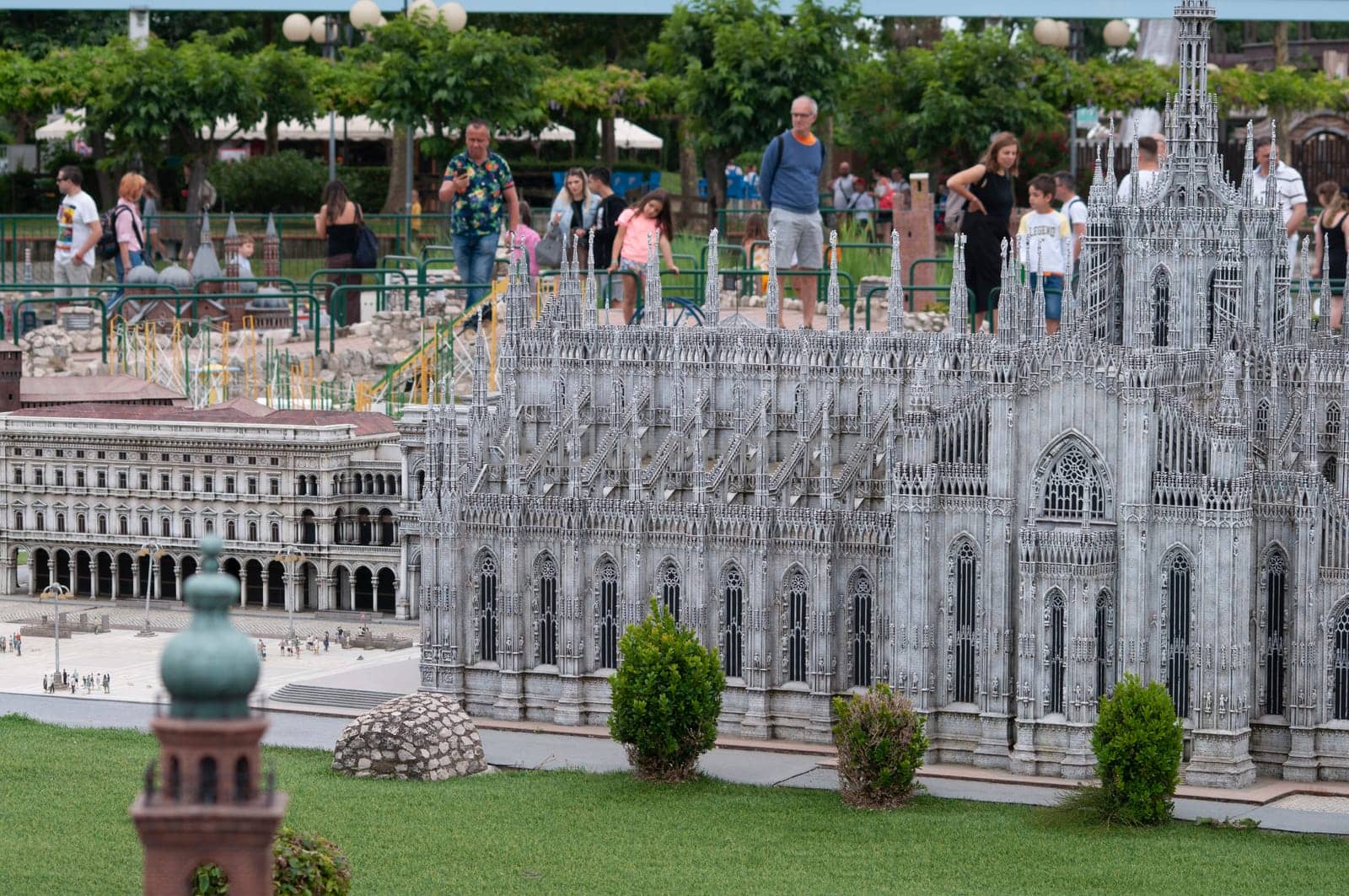 Viserba, Italy - June 25, 2024: People going at Theme park Italy in Miniature or Italia in Miniatura in Rimini, Italy - Reproduction of famous attractions in a small scale - Milan