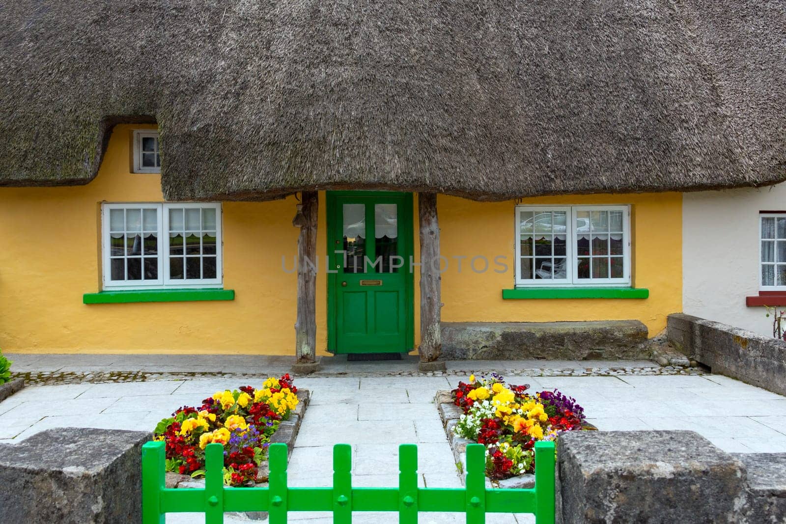 Thatched cottage in the village of Adare in County Limerick, Republic of Ireland.