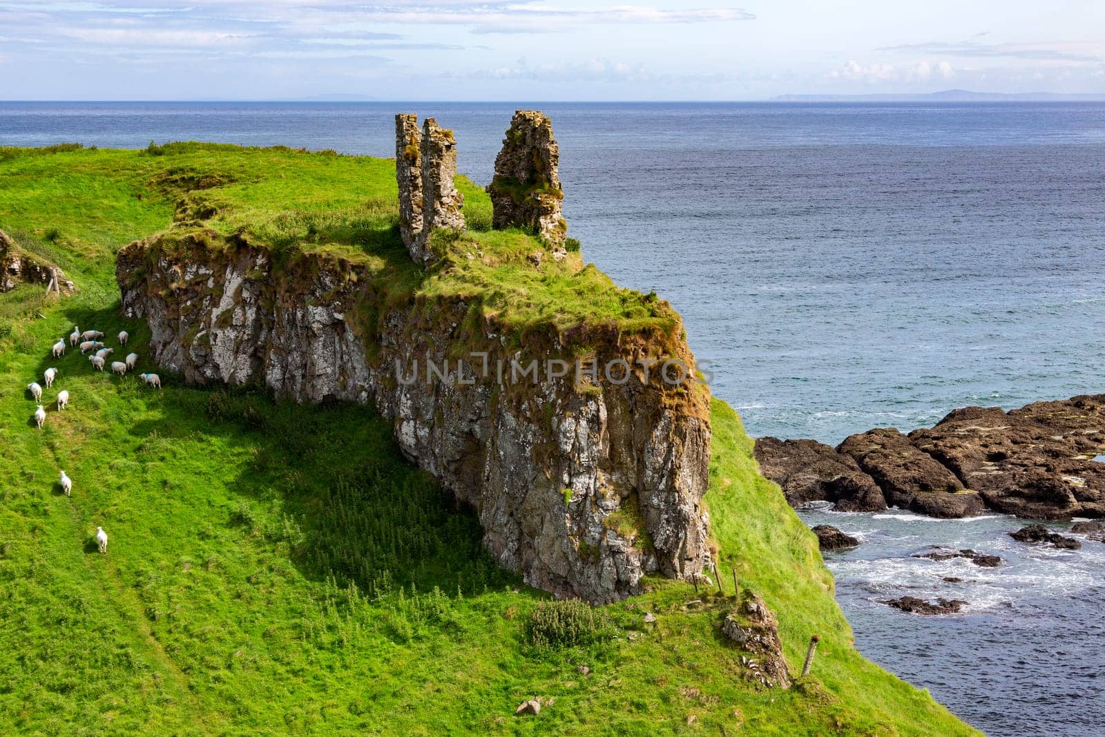 Dunseverick Castle in County Antrim, Northern Ireland. Located near the small village of Dunseverick and the Giant's Causeway. Dunseverick Castle and earthworks are Scheduled Historic Monuments in the Moyle District Council area. Dunseverick Castle and the peninsula on which it stands were given to the National Trust in 1962 by local farmer Jack McCurdy.