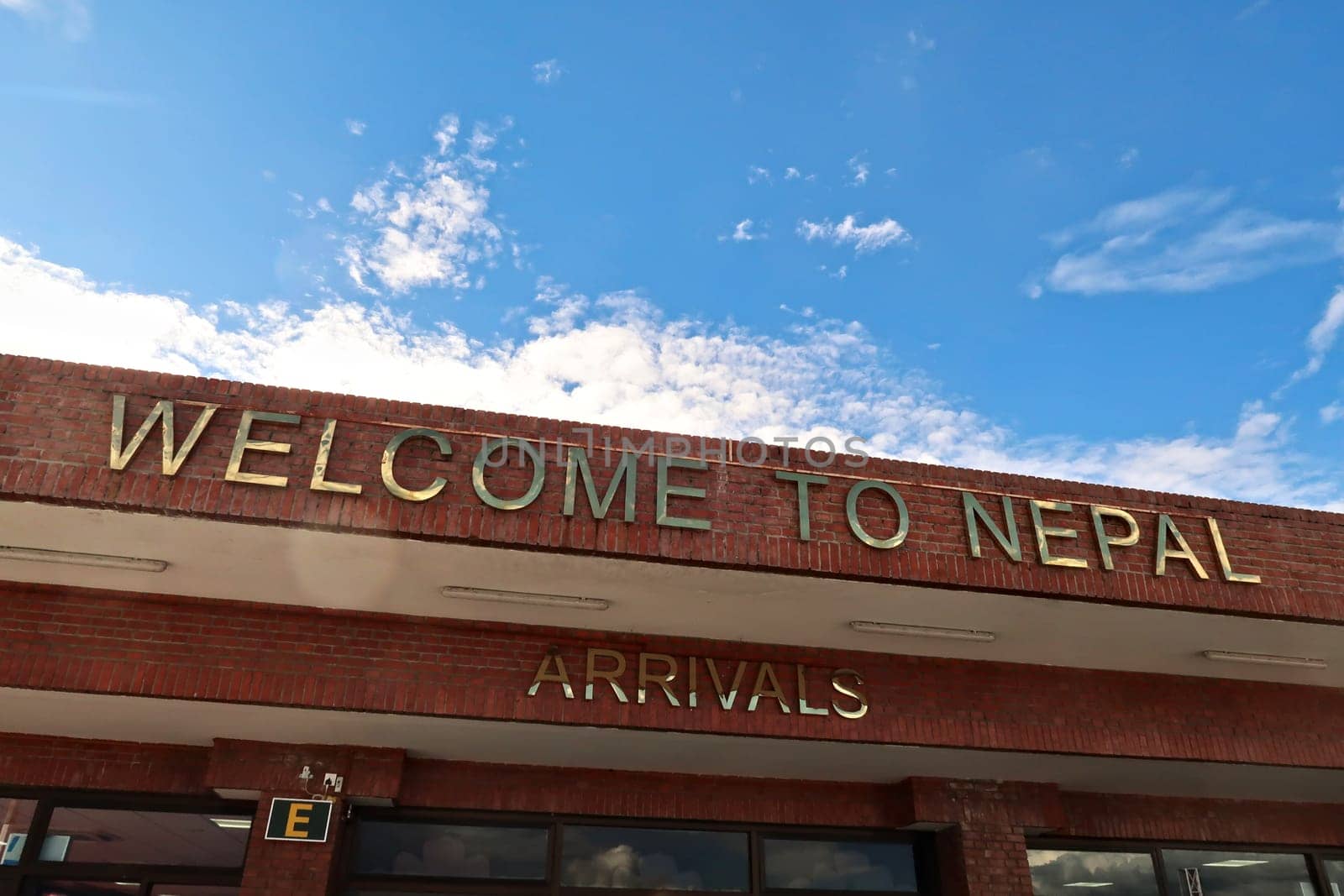 After landing at the Airport of Kathmandu, the sign over the arrival hall says: Welcome to Kathmandu, Nepal 2022