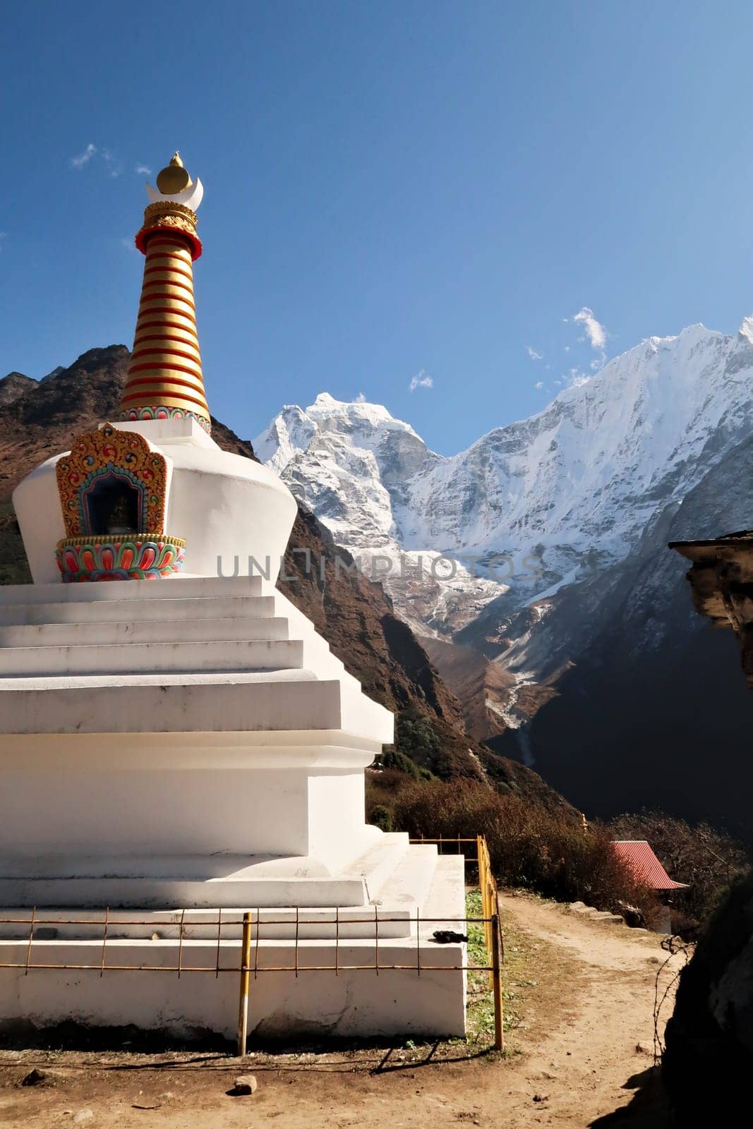 A stupa, pagoda in Tengboche, Tangboche village, Mount Kangtega can be seen in the background, Mount Everest Base Camp Trek, EBC, Nepal 2022