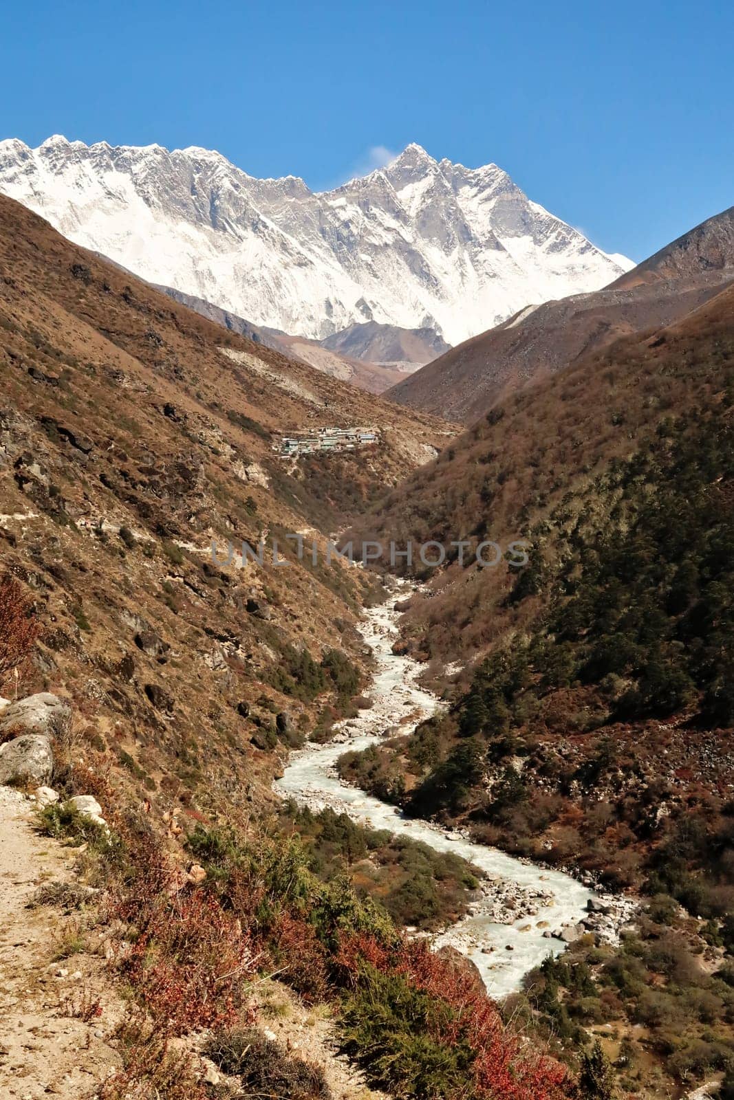 View onto the Imja Khola River, Shomare village in front of Mount Nuptse, Everest and Lhotse can be seen in the background, Mount Everest Base Camp Trek, EBC, Nepal 2022