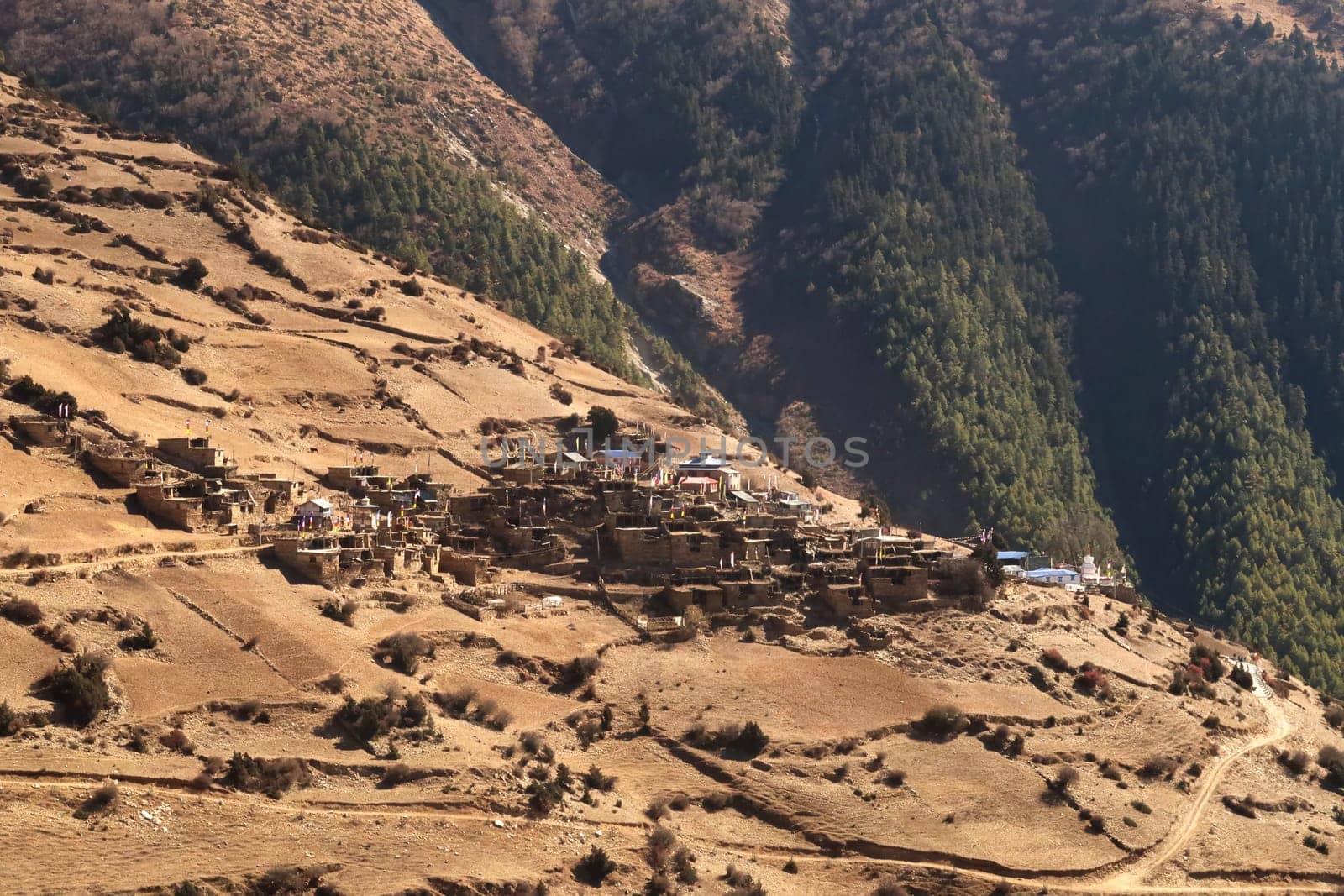 View onto the traditional mountain village of Ghyaru from the trail to Manang, Annapurna Circuit Trek, Nepal 2022