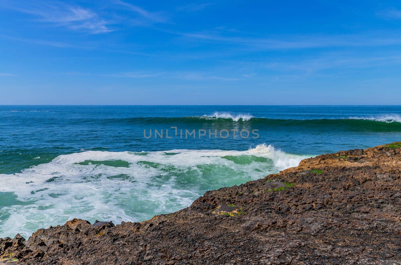 View of ocean waves and fantastic rocky coast in Ericeira, near Lisbon. Portugal
