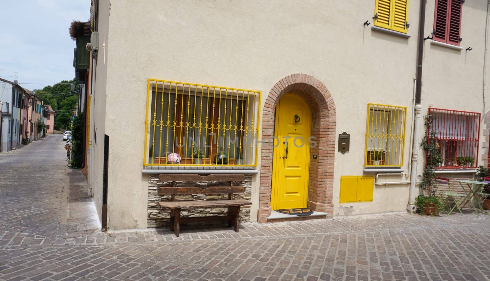 Rimini, Italy - June 25, 2024: The wall at Borgo San Giuliano typical street with low and colorful houses at Rimini, Italy