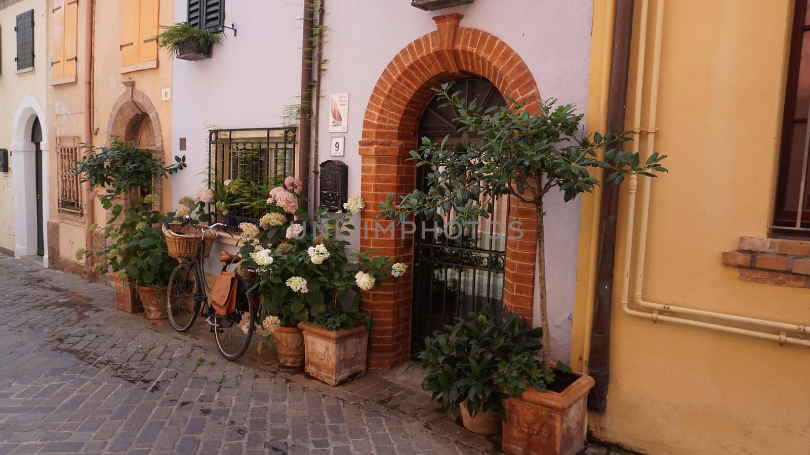 Rimini, Italy - June 25, 2024: The wall at Borgo San Giuliano typical street with low and colorful houses at Rimini, Italy