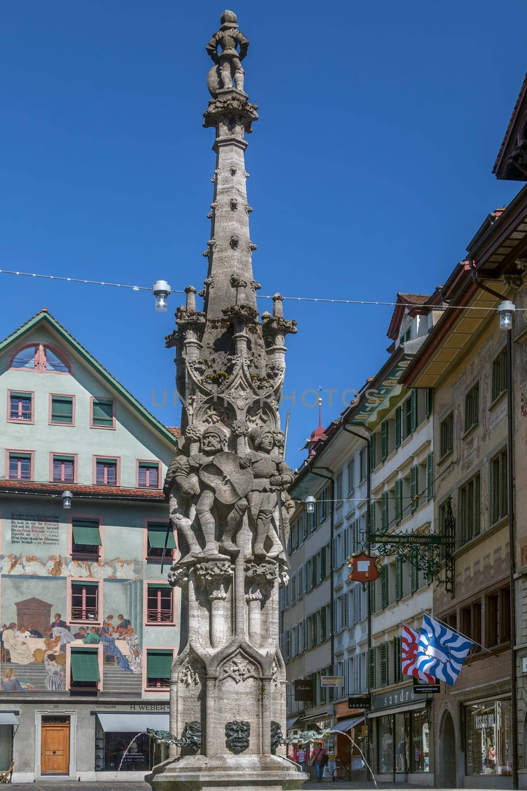 Historic buildings and fountain in the Old Town area of the city of Lucerne (Luzurn) in Switzerland
