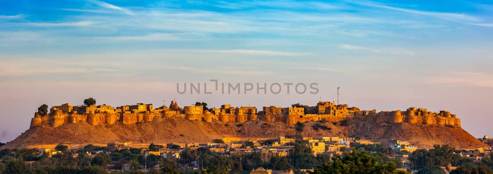 Panorama of Jaisalmer Fort - one of the largest forts in the world, known as the Golden Fort Sonar quila on sunrise. Jaisalmer, Rajasthan, India