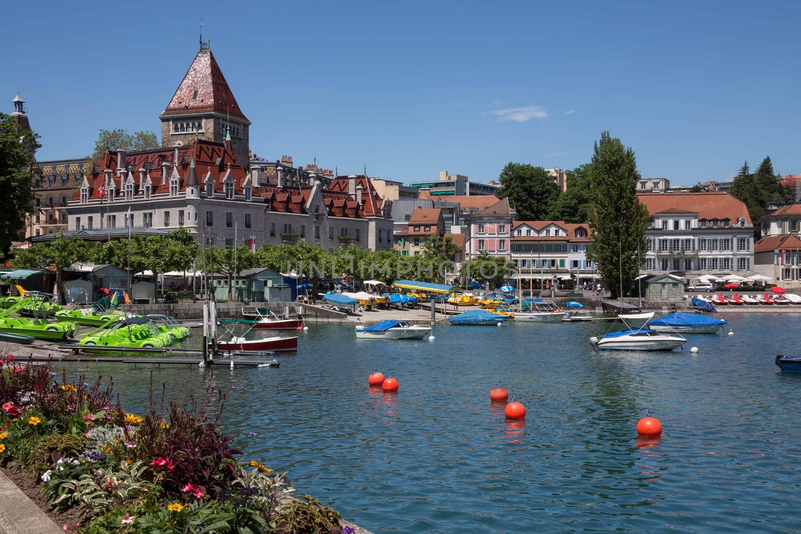 Chateau d'Ouchy and the waterfront in the town of Ouchy on the north shore of Lake Geneve in Switzerland.