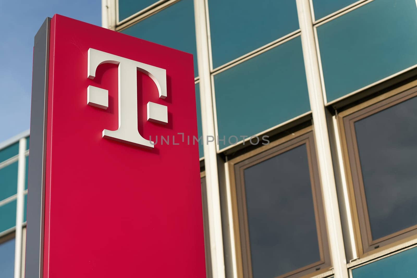 Logo of the Deutsche Telekom AG Group in front of a branch office in Magdeburg, Germany