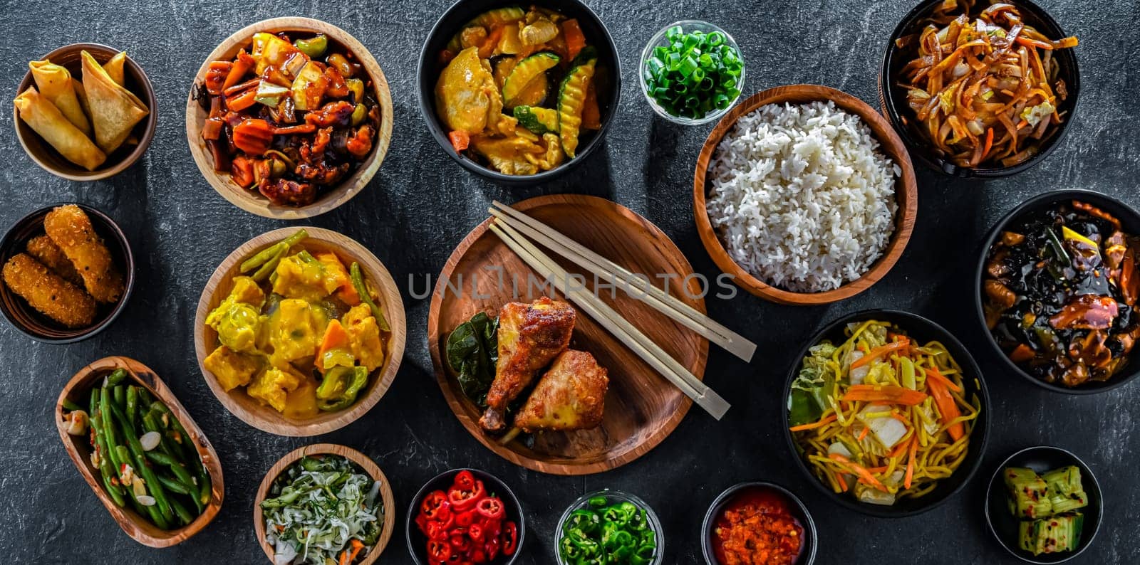 Composition with variety of east asian dishes.
