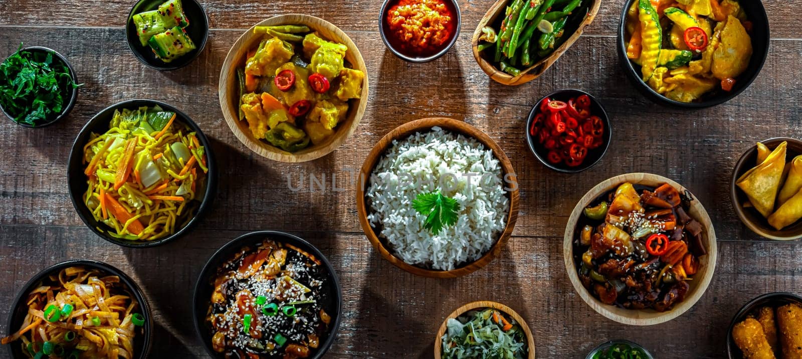 Composition with variety of east asian dishes.
