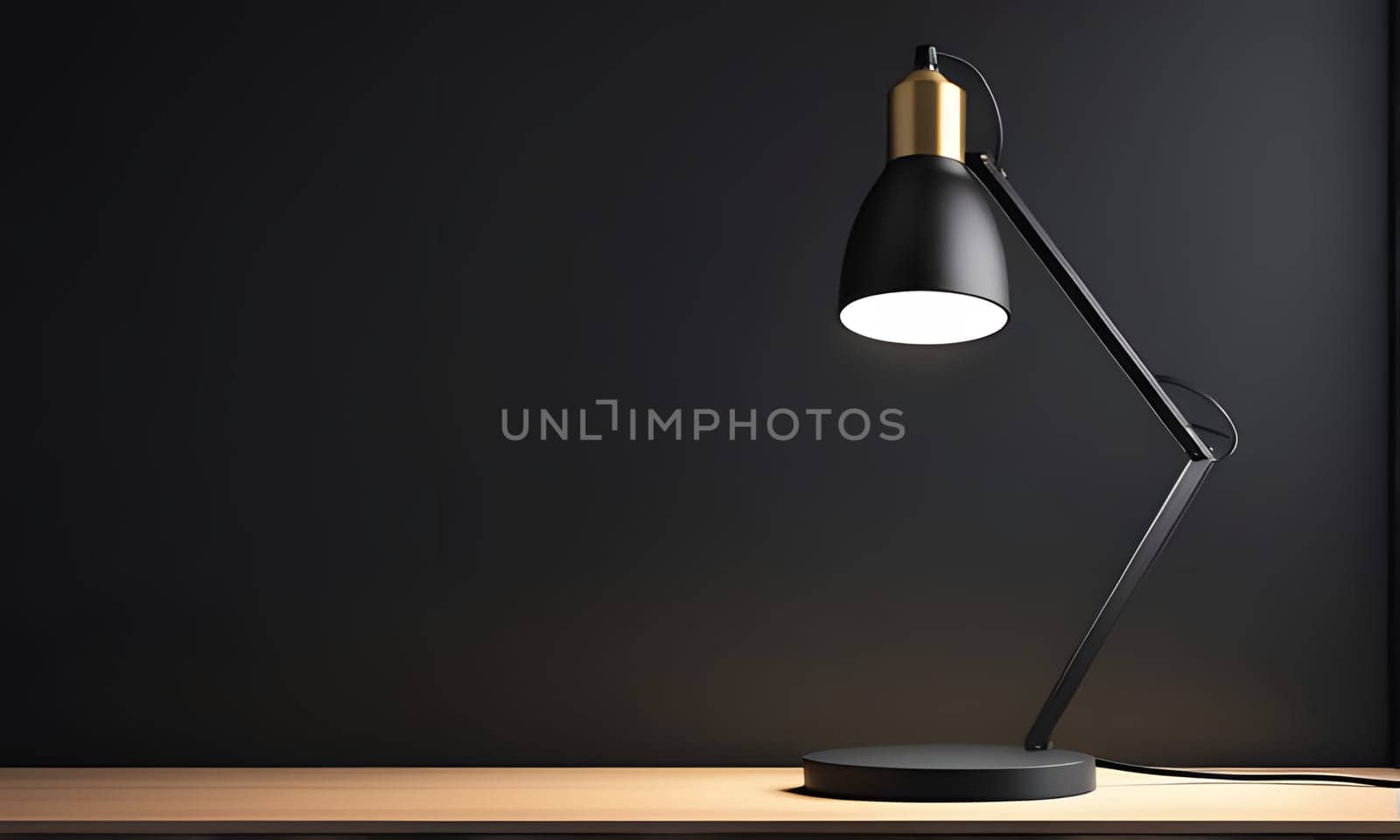 A black desk lamp with a gold accent on the base and a white light shining.