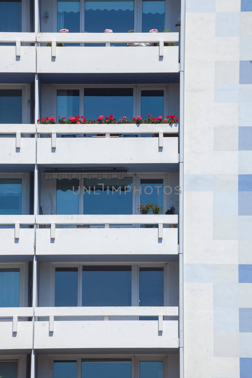 Monotonous white-blue residential building with balconies, Bremerhaven, Bremen, Germany