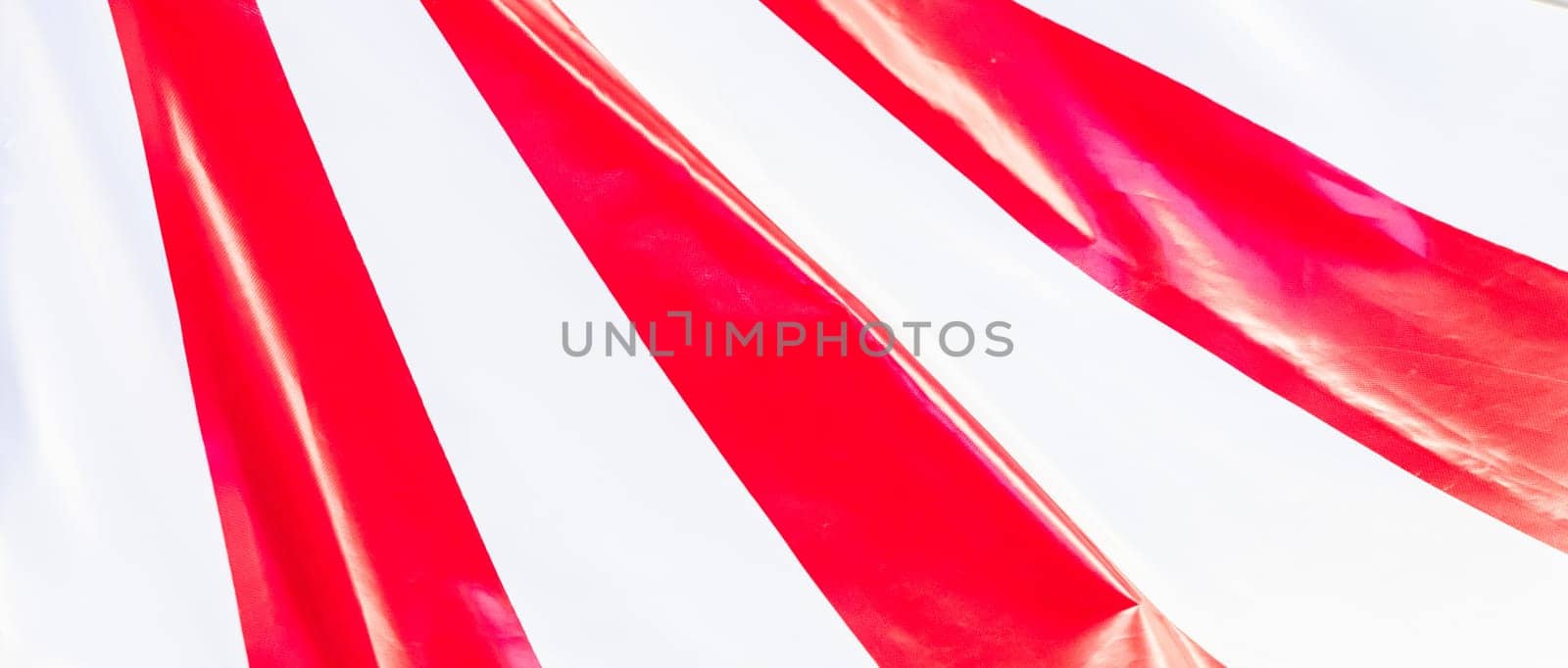 Circus tent background. Colorful design, striped white and red, retro entertainment.