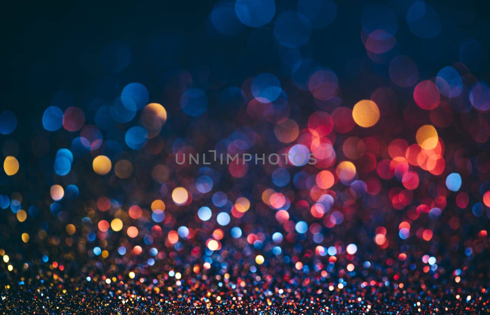 Abstract neon halftone color bokeh texture. Sparkling blur holiday light. Christmas nad new year eve blurred background. Disco music bright glow design.