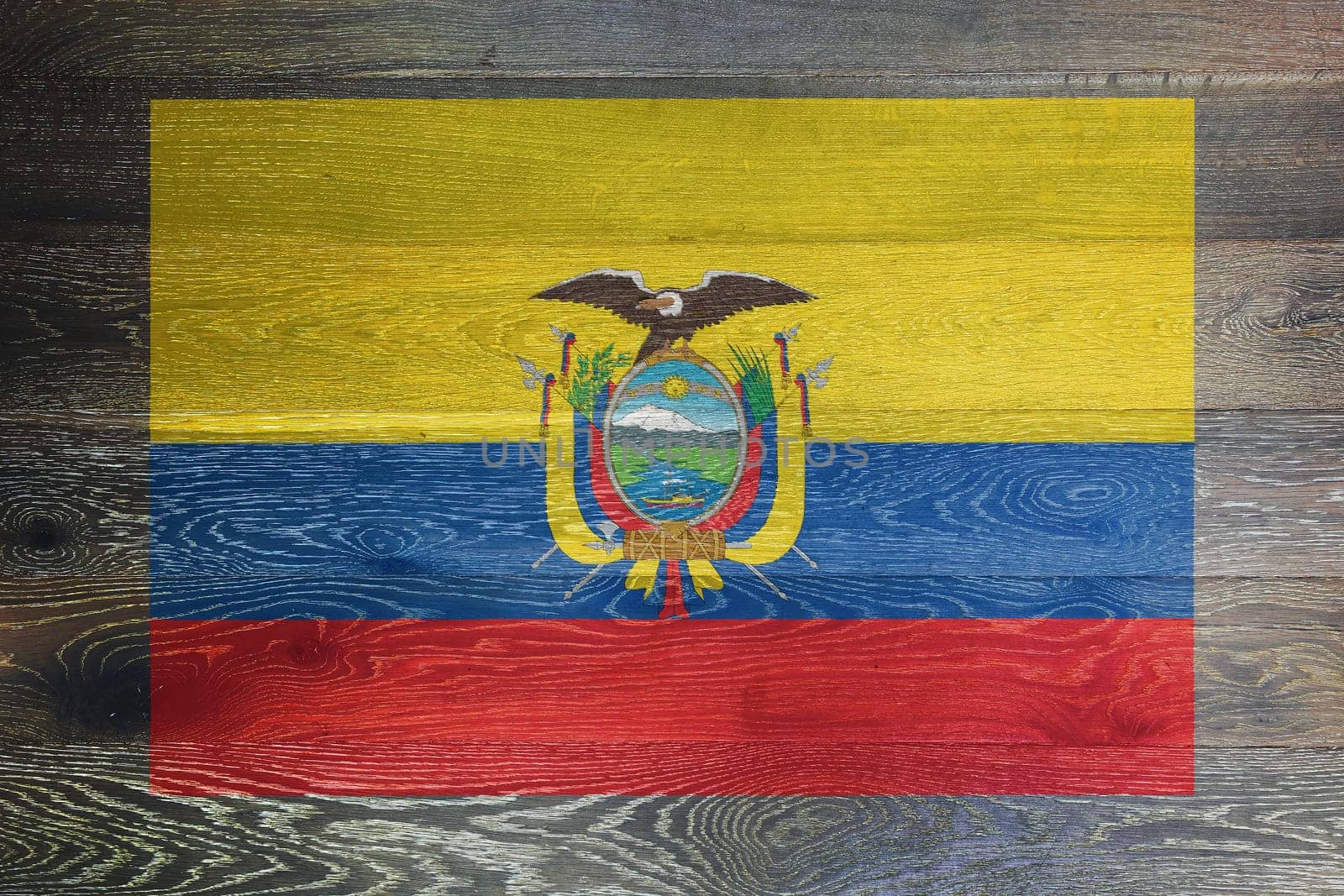 An Ecuador flag on rustic old wood surface background