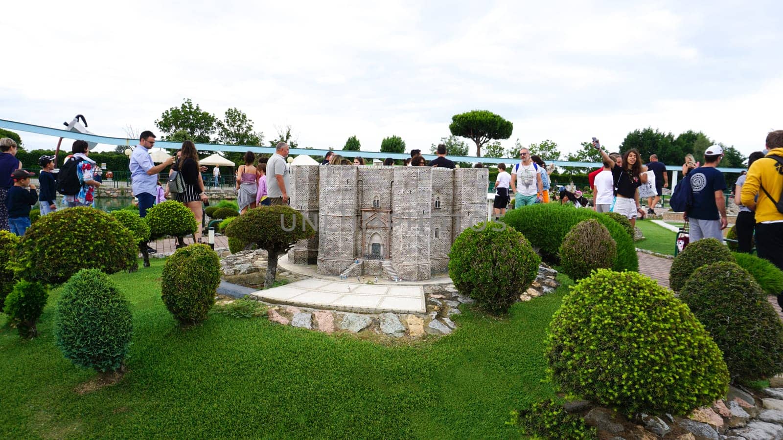 Viserba, Italy - June 25, 2024: People going at Theme park Italy in Miniature or Italia in Miniatura in Rimini, Italy - Reproduction of famous attractions in a small scale