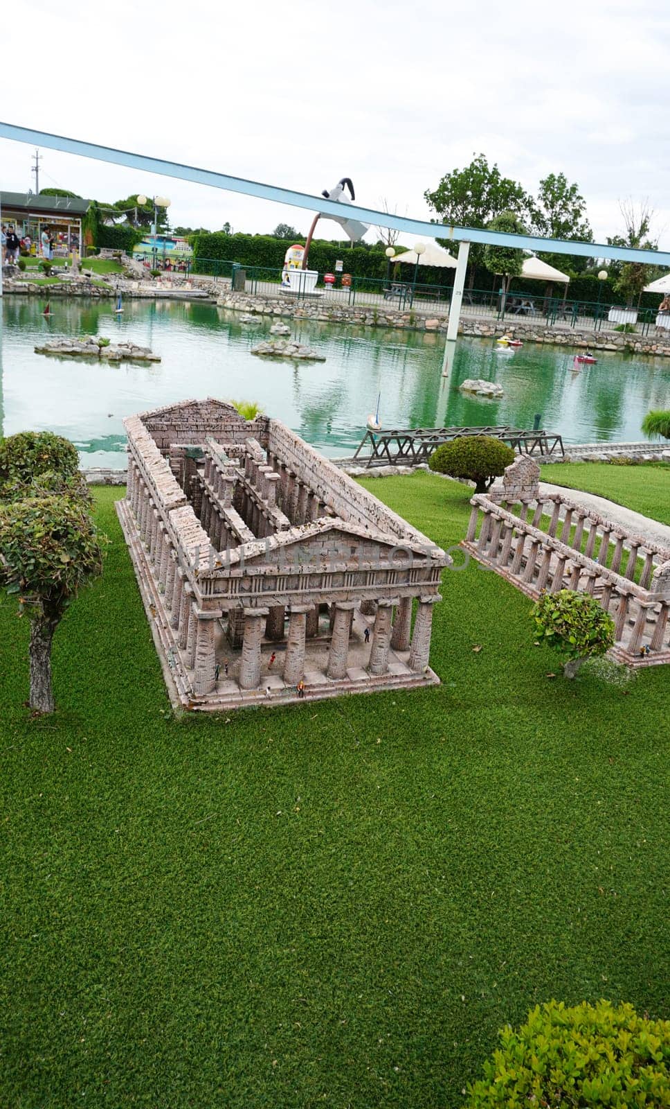 Viserba, Italy - June 25, 2024: People going at Theme park Italy in Miniature or Italia in Miniatura in Rimini, Italy - Reproduction of famous attractions in a small scale