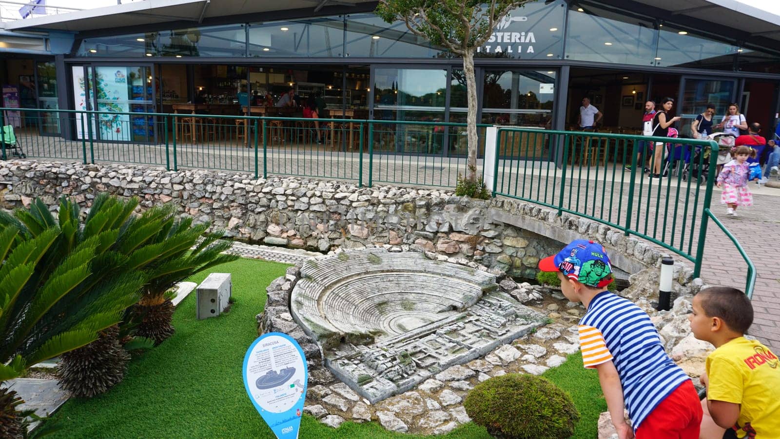 Viserba, Italy - June 25, 2024: People going at Theme park Italy in Miniature or Italia in Miniatura in Rimini, Italy - Reproduction of famous attractions in a small scale