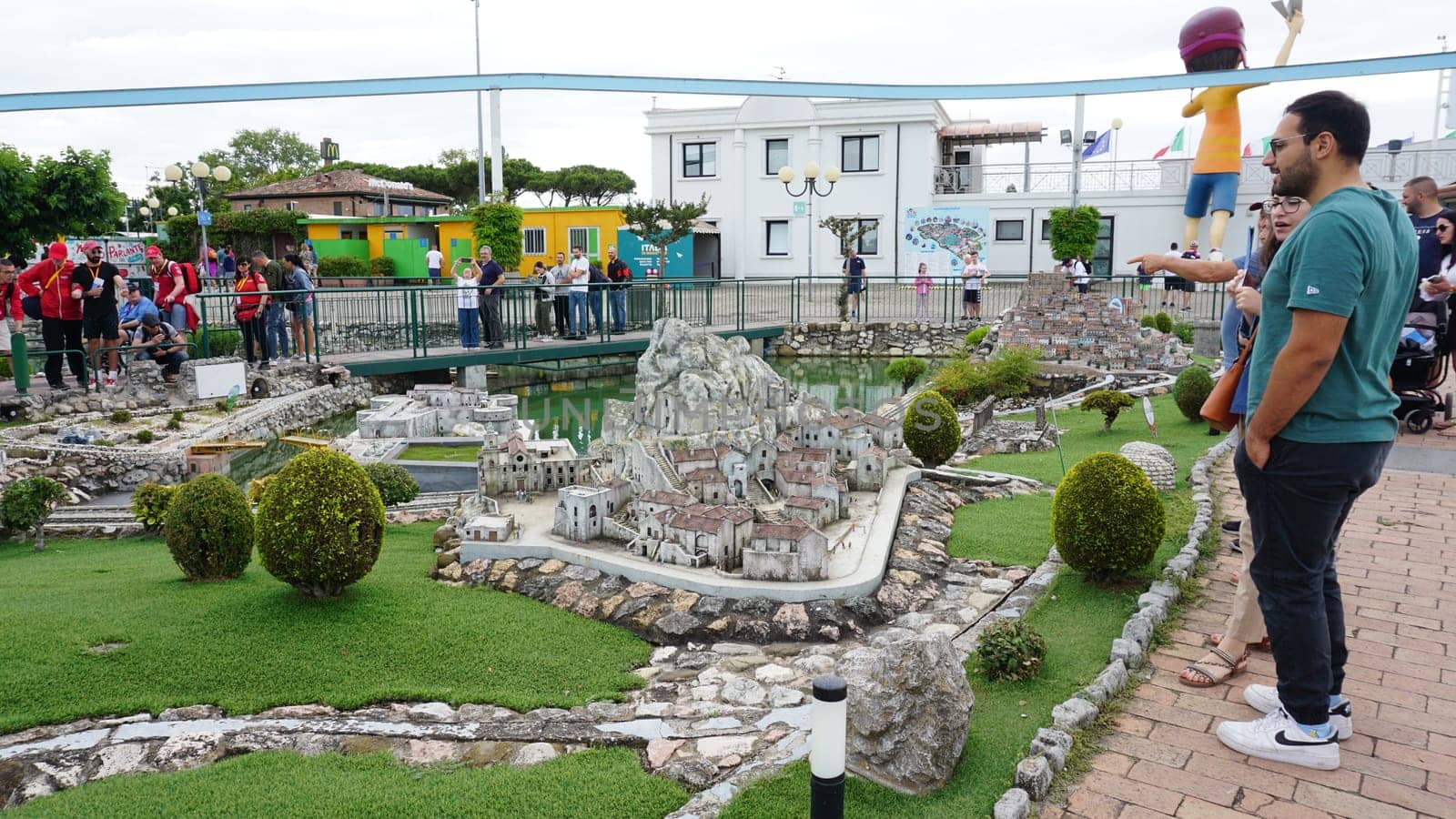 Viserba, Italy - June 25, 2024: People going at Theme park Italy in Miniature or Italia in Miniatura in Rimini, Italy - Reproduction of famous attractions in a small scale
