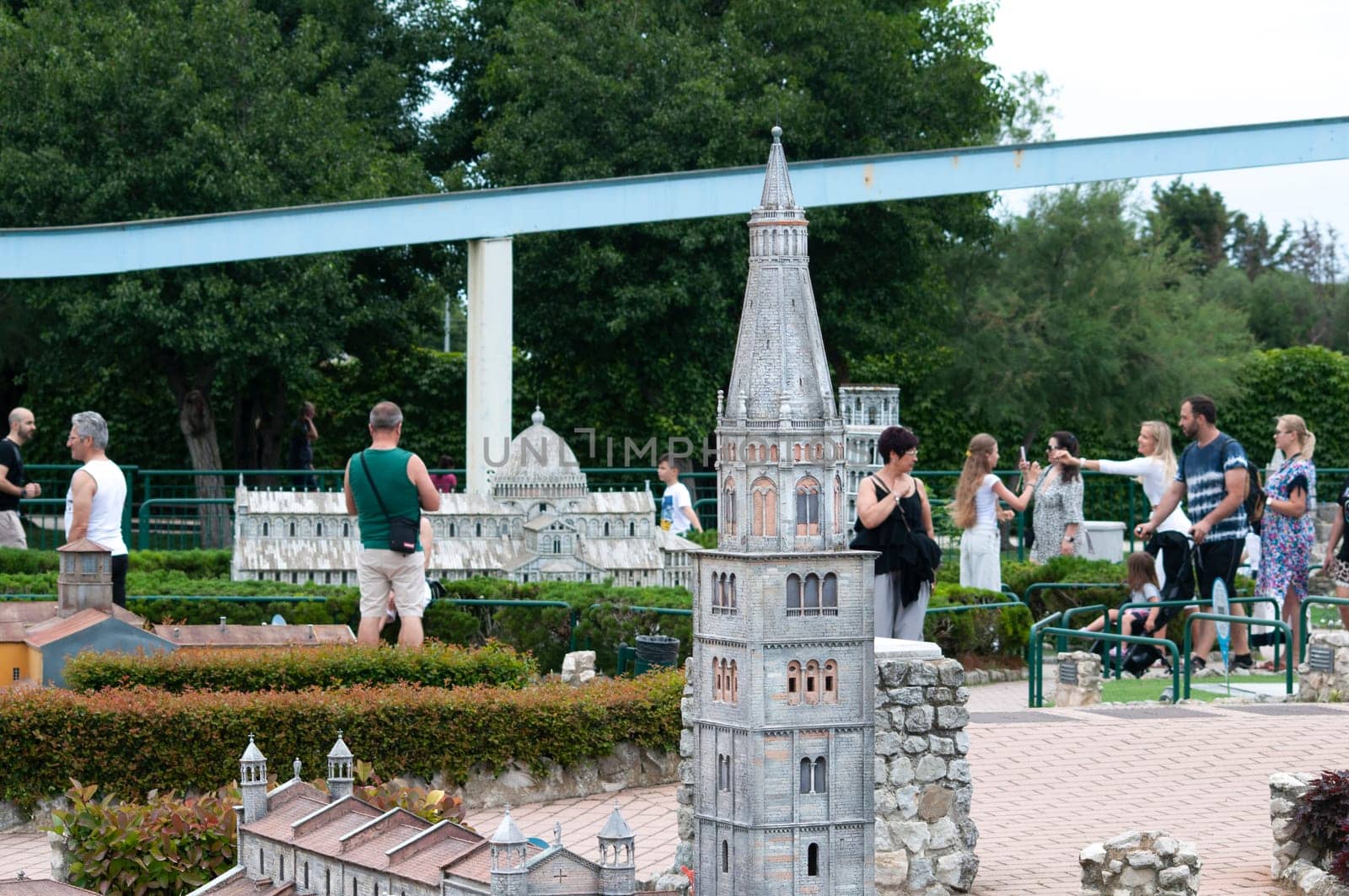 Viserba, Italy - June 25, 2024: People going at Theme park Italy in Miniature or Italia in Miniatura in Rimini, Italy - Reproduction of famous attractions in a small scale