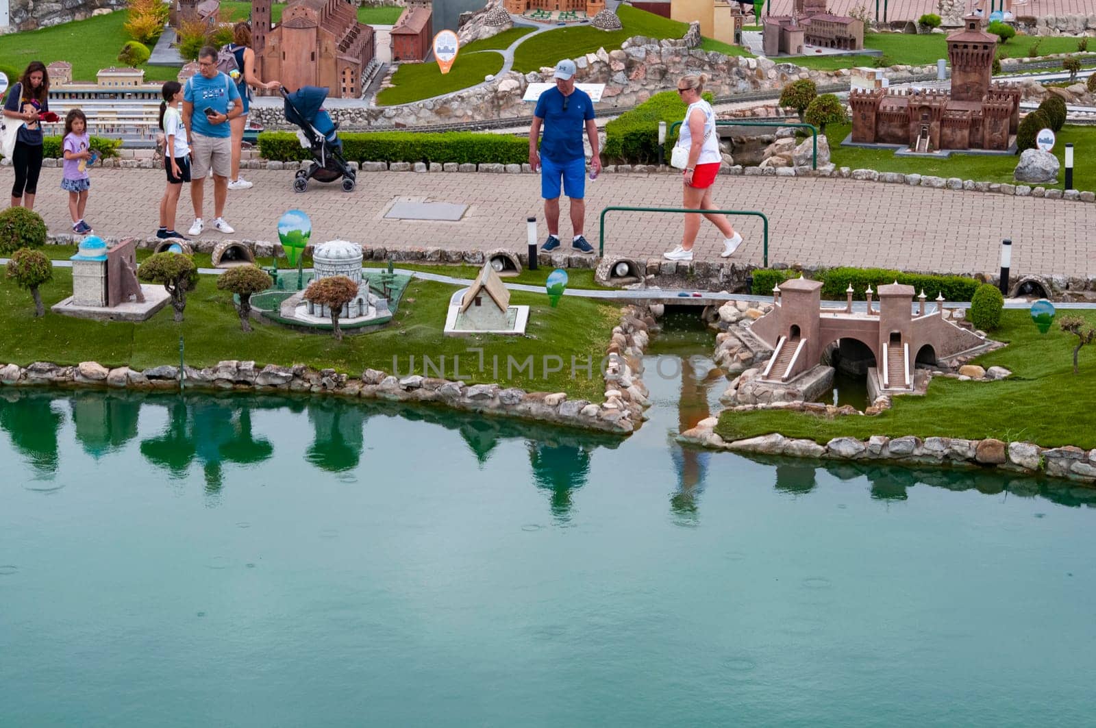 Viserba, Italy - June 25, 2024: People going at Theme park Italy in Miniature or Italia in Miniatura in Rimini, Italy - Reproduction of famous attractions in a small scale
