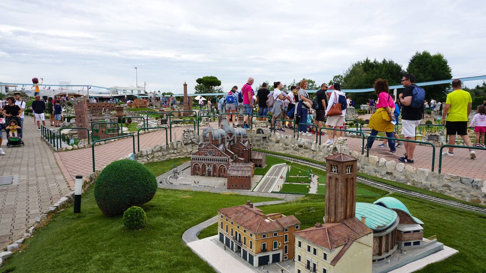 Viserba, Italy - June 25, 2024: People going at Theme park Italy in Miniature or Italia in Miniatura in Rimini, Italy - Reproduction of famous attractions in a small scale