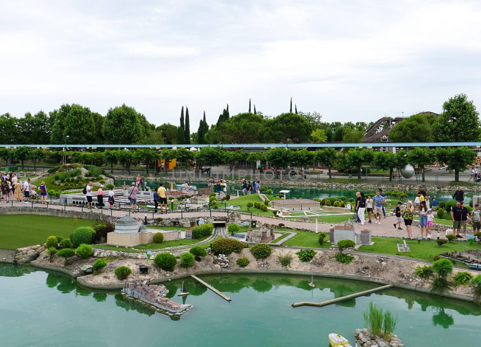 Viserba, Italy - June 25, 2024: People going at Theme park Italy in Miniature or Italia in Miniatura in Rimini, Italy - Reproduction of famous attractions in a small scale