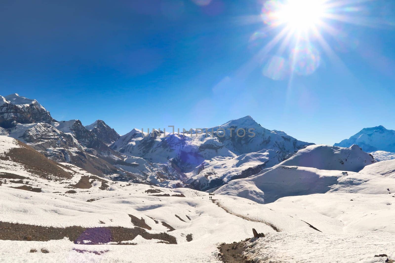 View onto the trail from Thorung, Thorong High Camp to the Thorong, Thorang, Thorung La Pass, running through a snow covered landscape, Annapurna Circuit Trek, Nepal 2022