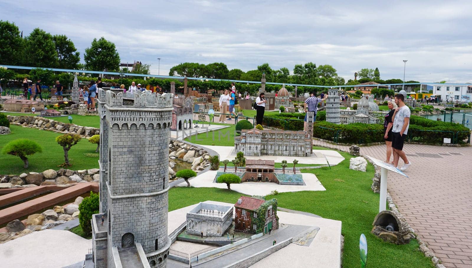 Viserba, Italy - June 25, 2024: People going at Theme park Italy in Miniature or Italia in Miniatura in Rimini, Italy - Reproduction of famous attractions in a small scale