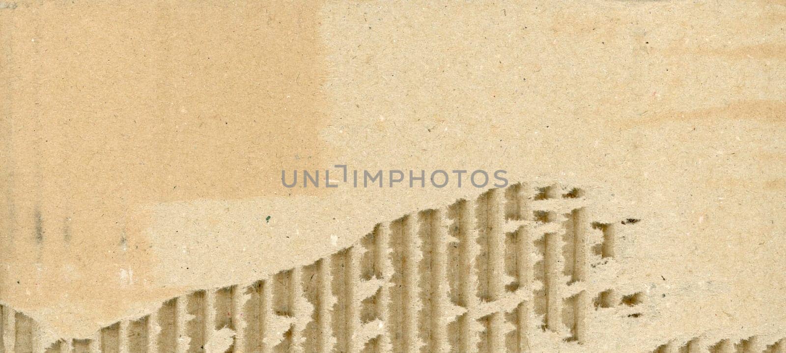 brown corrugated cardboard texture useful as a background
