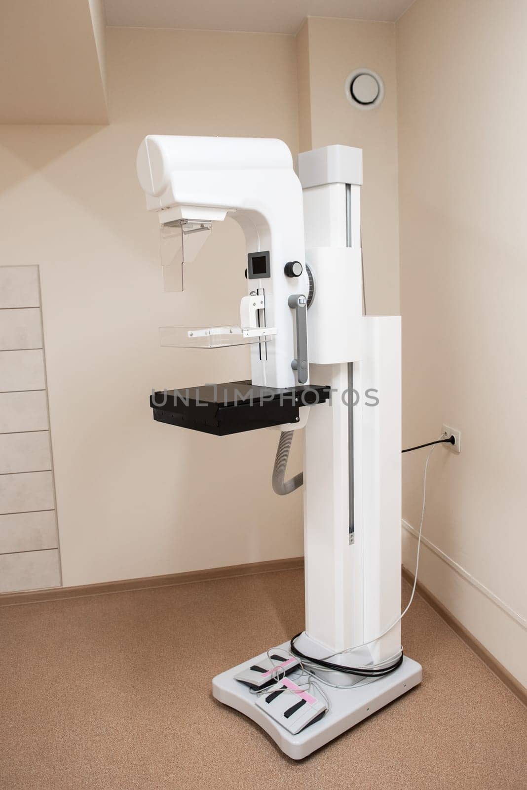 Clinic room with equipment for breast x-ray