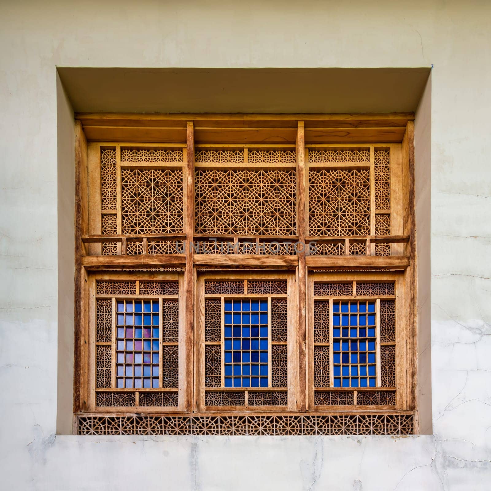 Intricate wooden window at the Shakikhanovs Palace in Shaki, Azerbaijan
