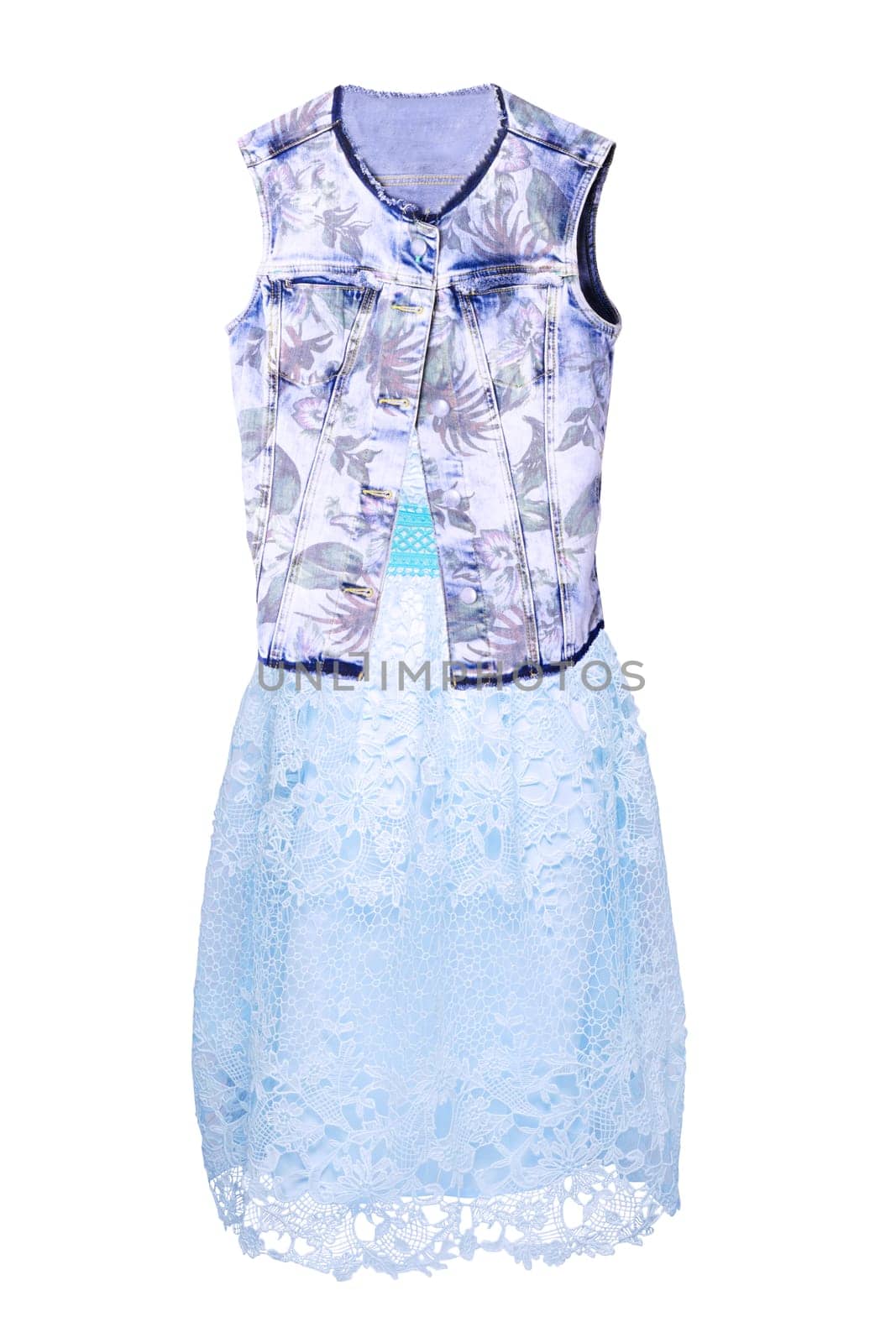 Women summer clothes. Close-up of a light turquoise stylish evening dress with lace and a blue jeans vest or jacket for woman on mannequin isolated. Jeans fashion.