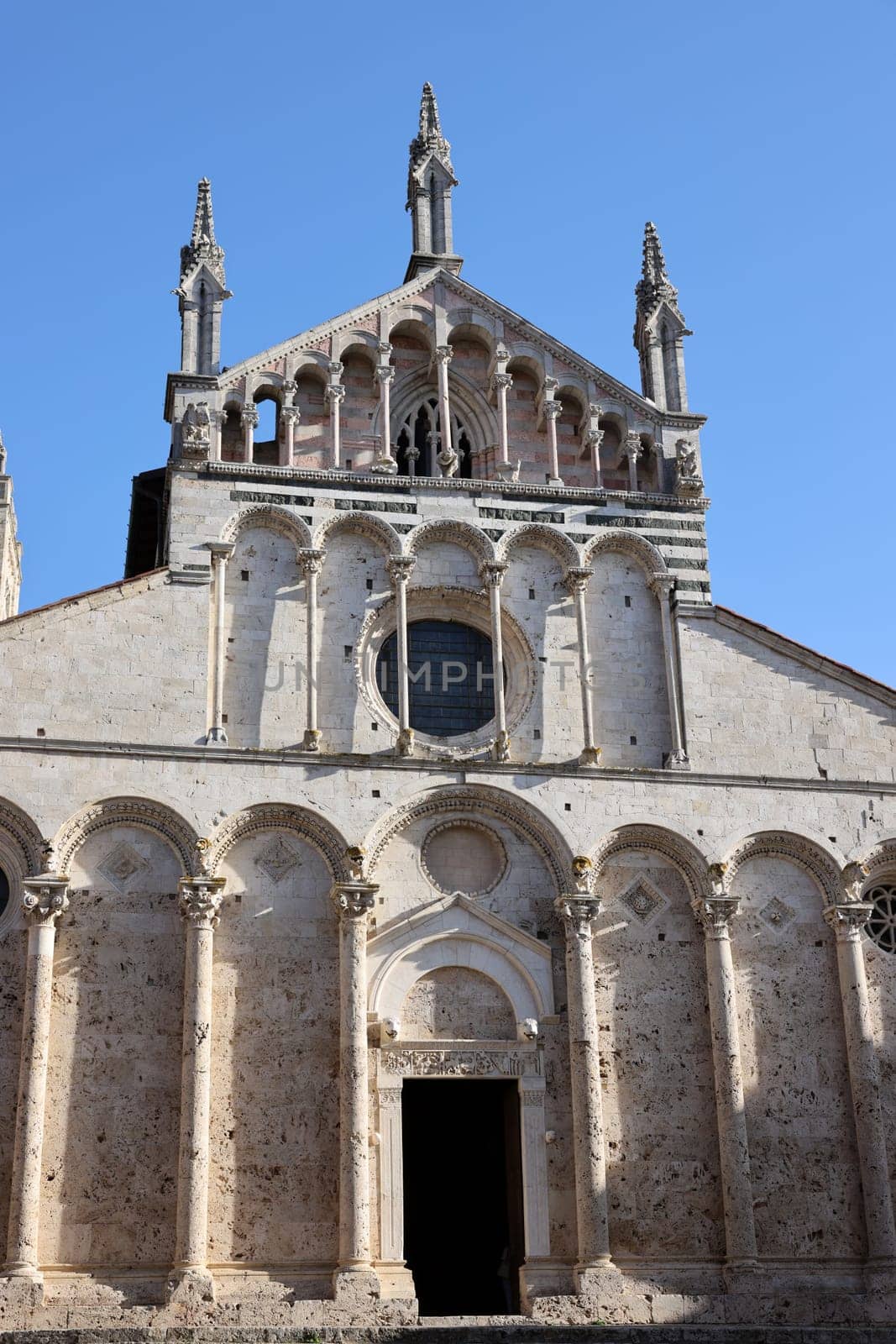 The Cathedral of Saint Cerbonius with Bell tower at the Garibaldi square in Massa Marittima. Italy