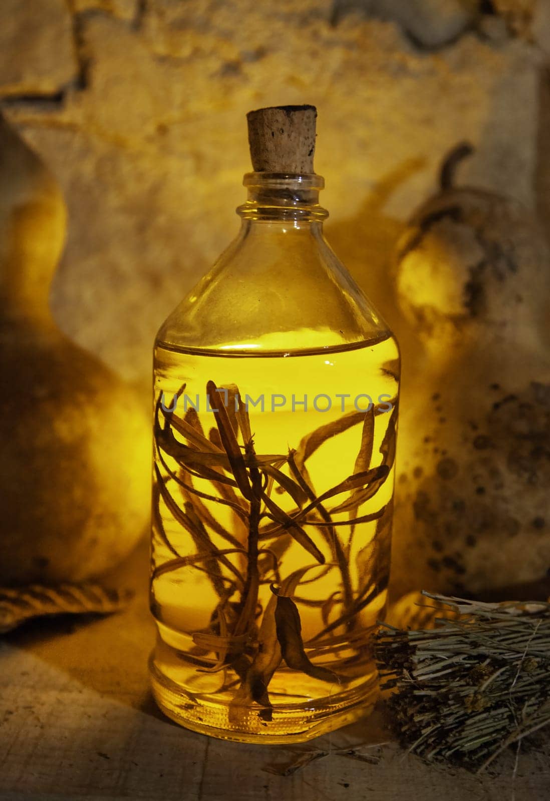 Detail of a glass jar with herbs for witchcraft