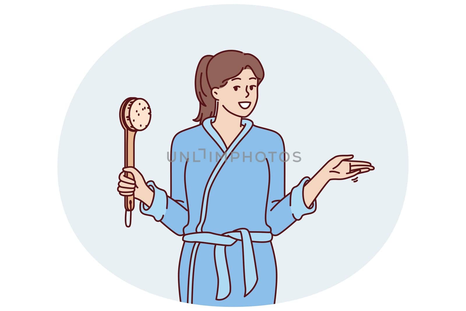 Woman in bathrobe holding shower brush in hand going to take bath and do self bodycare or anti-aging treatments. Positive girl after shower points to side, drawing your attention to importance hygiene